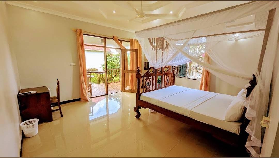 Bright bedroom with a balcony